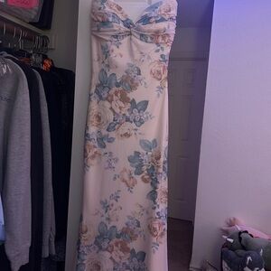 strapless windsor floral dress cream background, green leaves and yellow flowers